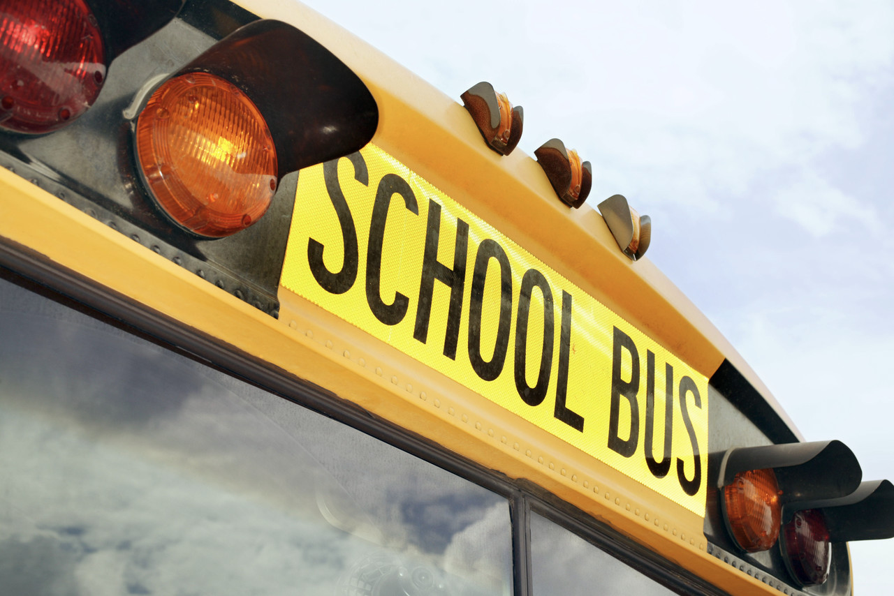 Flashing Lights and Sign on School Bus