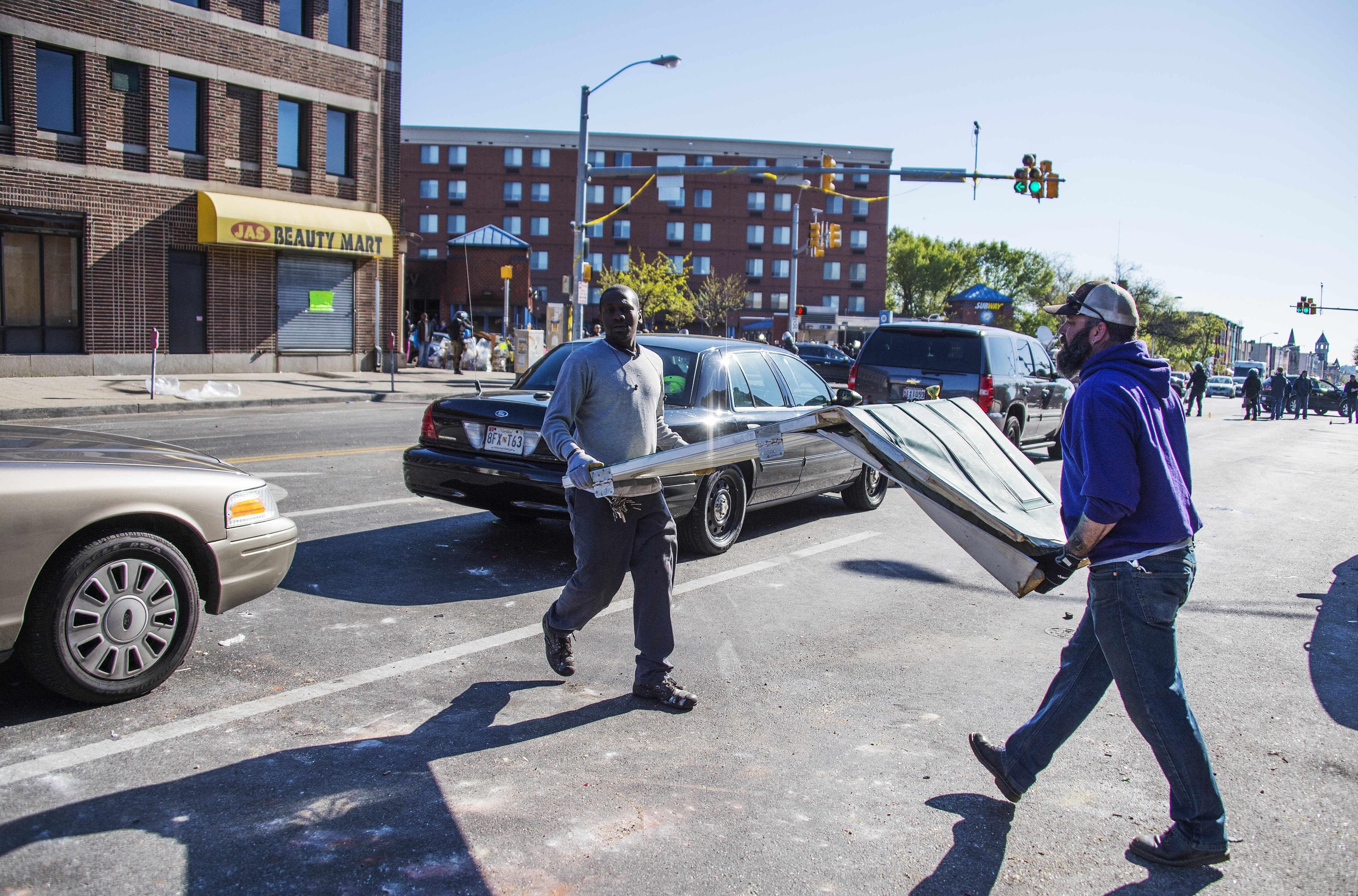 People Cleaning Up Baltimore After Riots