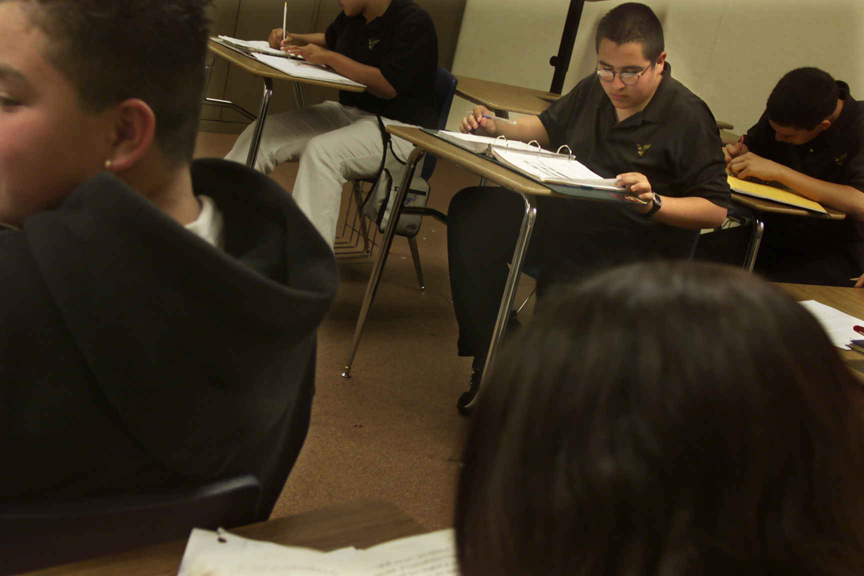 (with glasses) Juan Torres, 15, a student at Ball Junior High in Anaheim was getting failing marks l