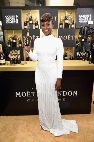 Moet & Chandon At The 74th Annual Golden Globe Awards - Red Carpet