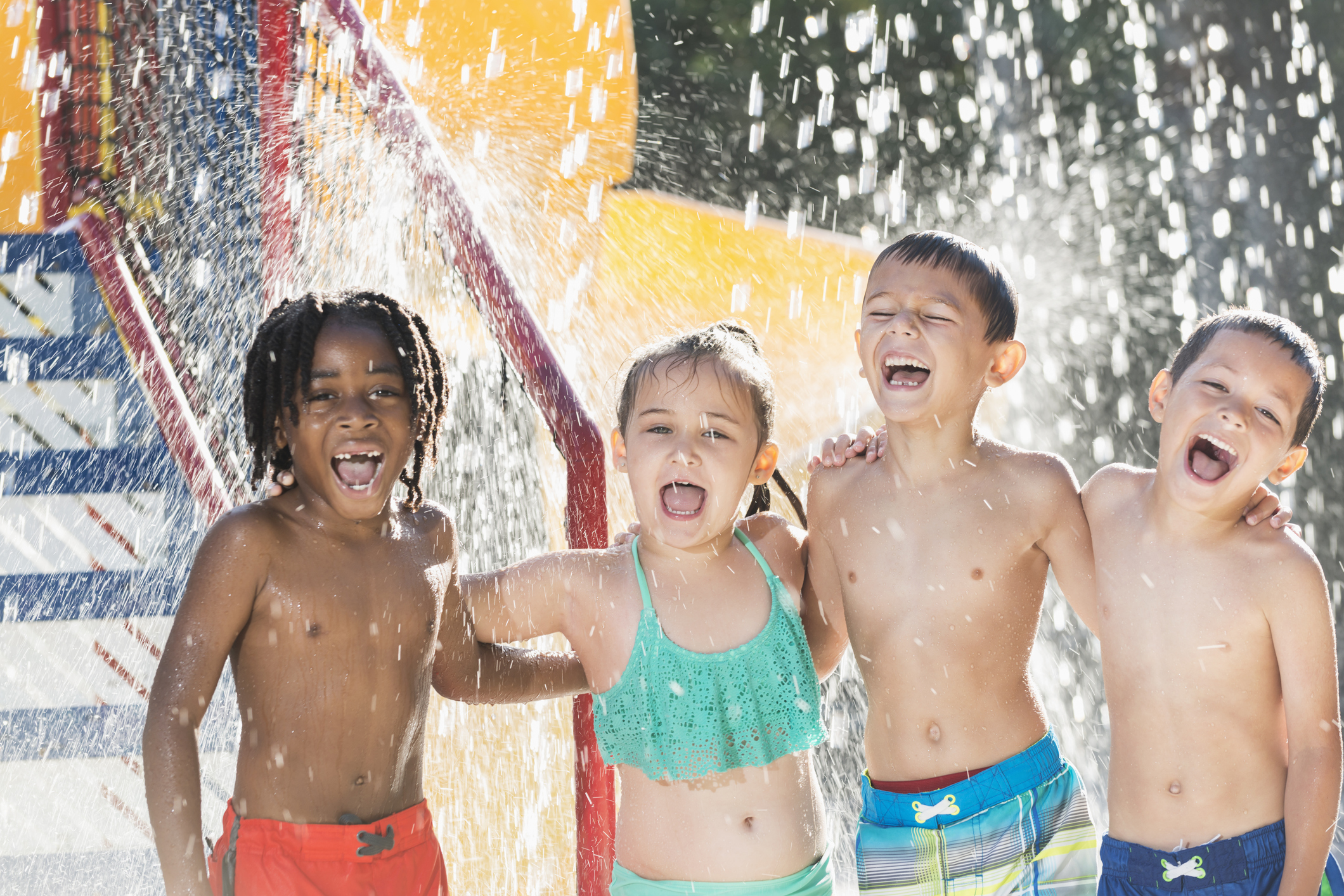 Multi-ethnic children at a water park