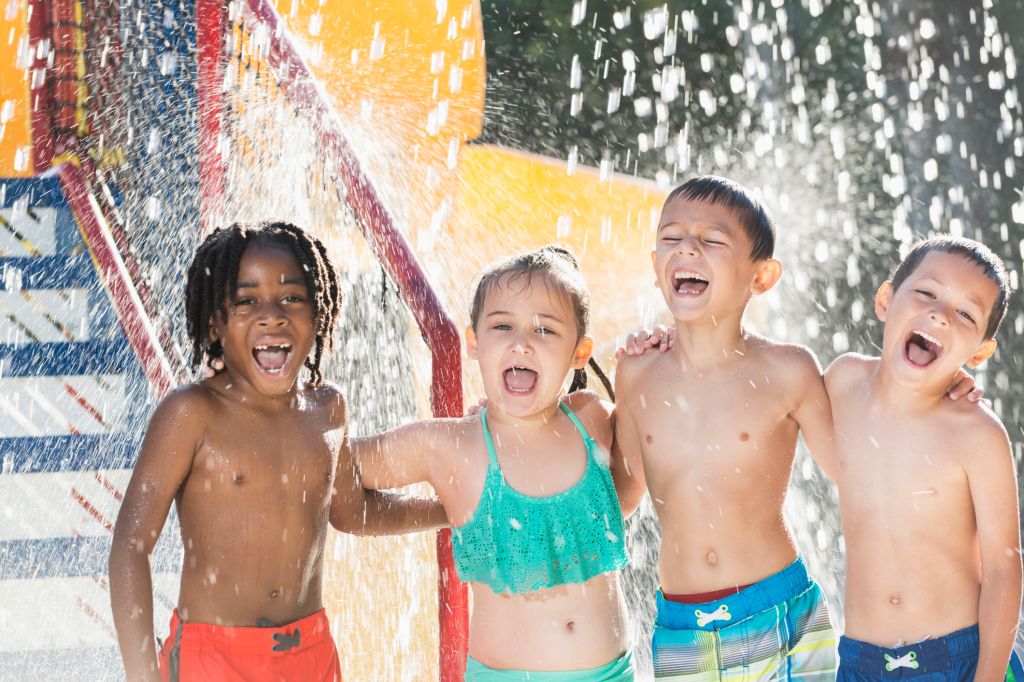 Multi-ethnic children at a water park