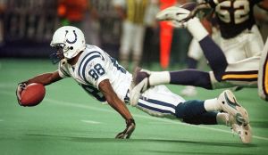 Indianapolis Colts Marvin Harrison dives for a few