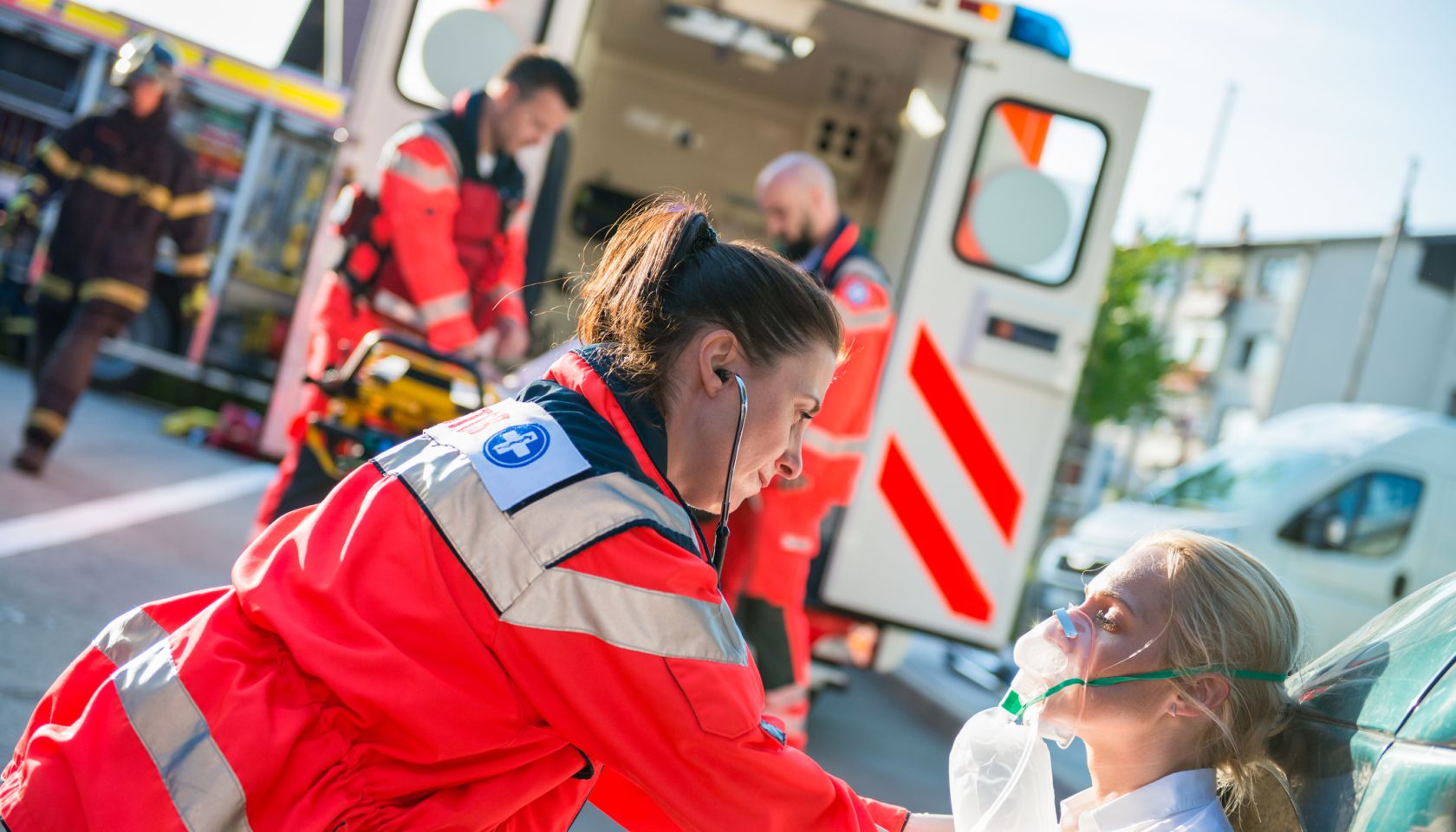 Female Paramedic Helping Injured Women