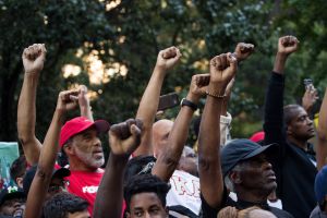 Rally In Support Of NFL Quarterback Colin Kaepernick Outside The League's HQ In New York