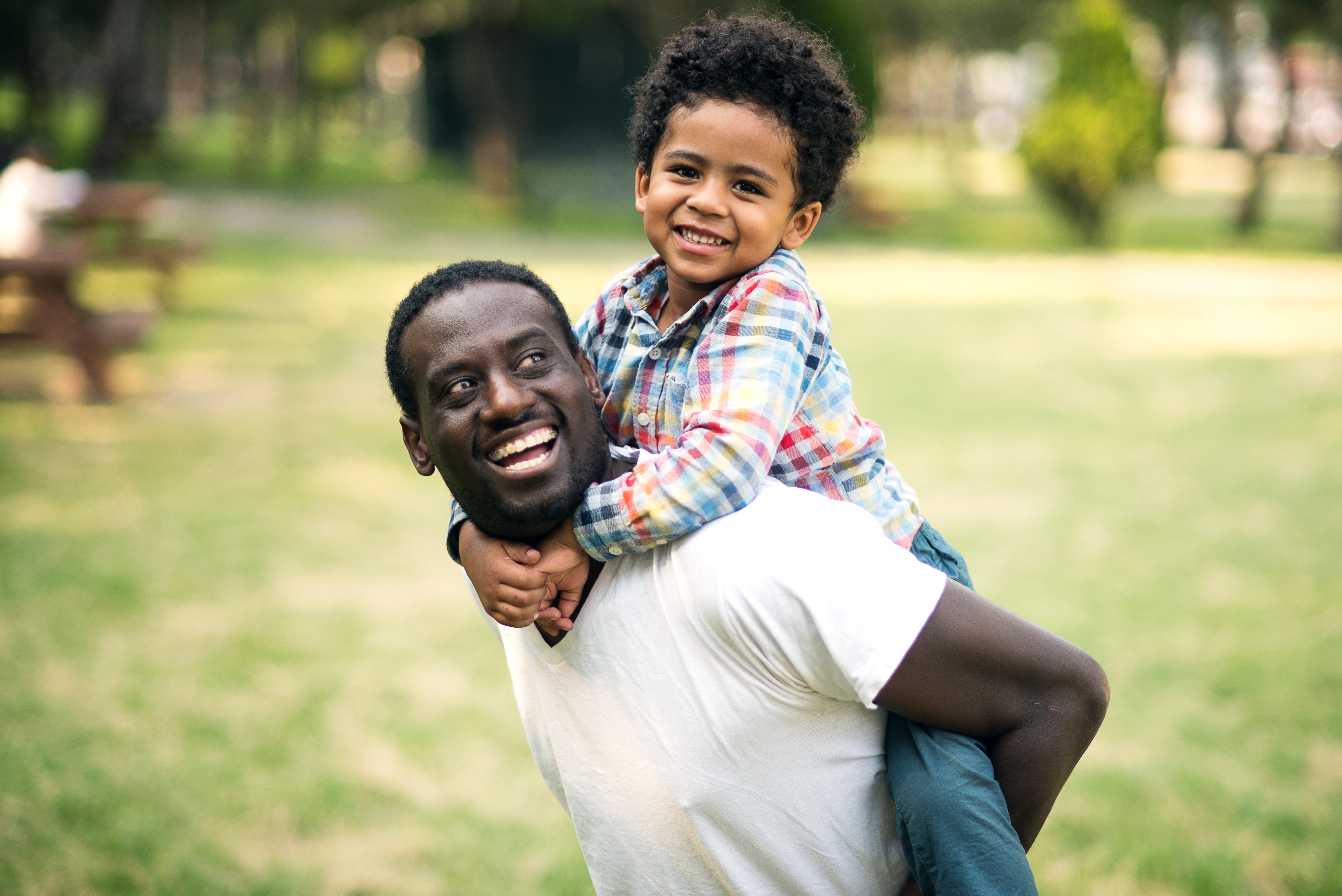 Father and son at the park having fun.