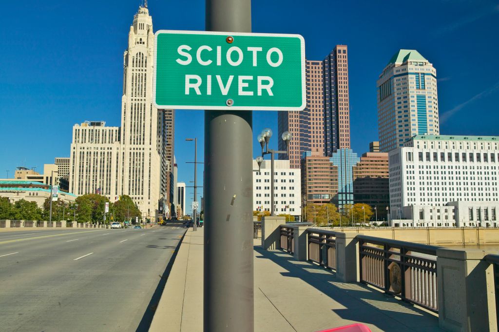 Scioto River Sign in Columbus Ohio, with setting sunlight