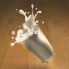 Milk spilling out of glass onto wooden floor, close-up, (composite)