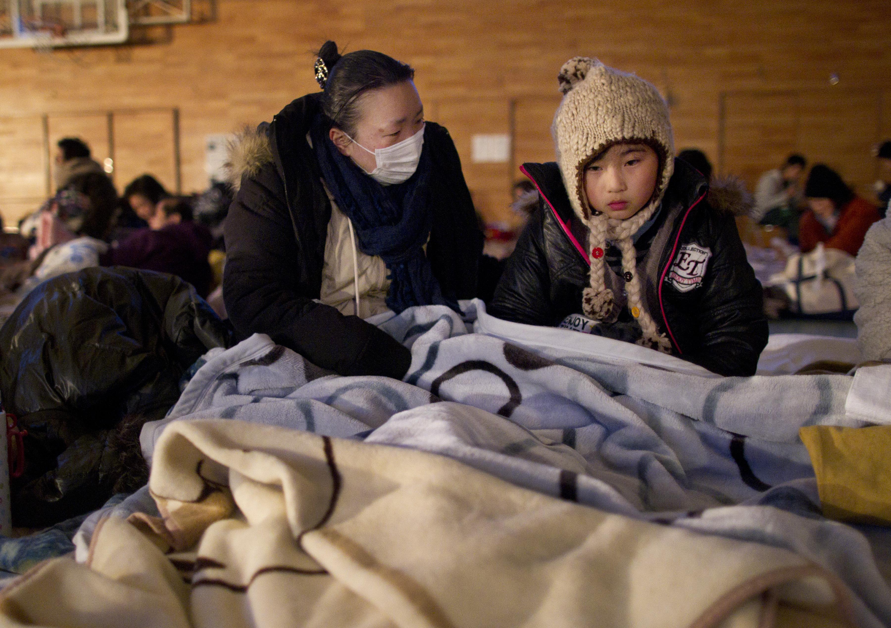 Rescue Work Continues in Japan As Nuclear Threat Looms