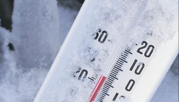Thermometer registers below zero in snow