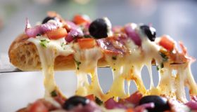Cheesy Pizza with Olives, Tomato, Pepper & Herbs