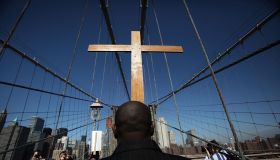 Way Of The Cross Procession Crosses Over New York's Brooklyn Bridge
