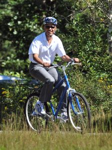 US President Barack Obama rides bicycle