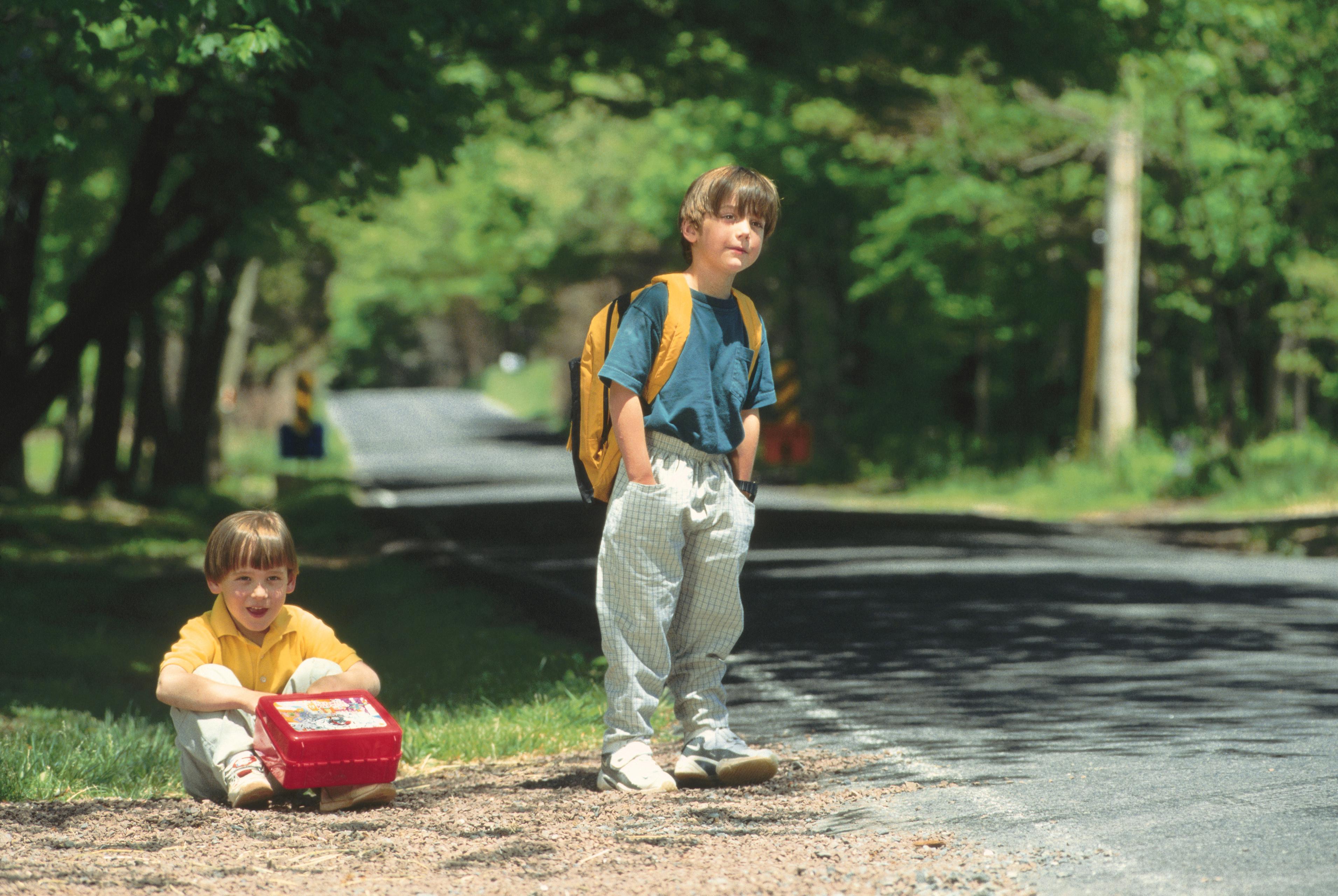 Boys waiting for school bus