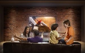 Family with children watching Baseball game on TV