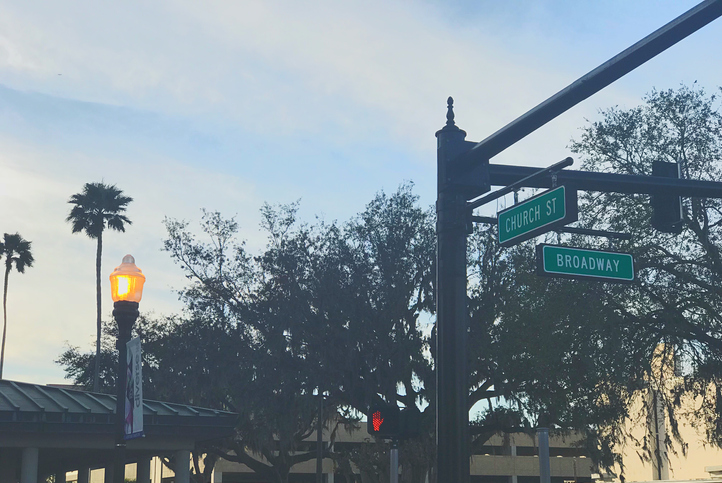 Low Angle View Of Road Signs Against Sky