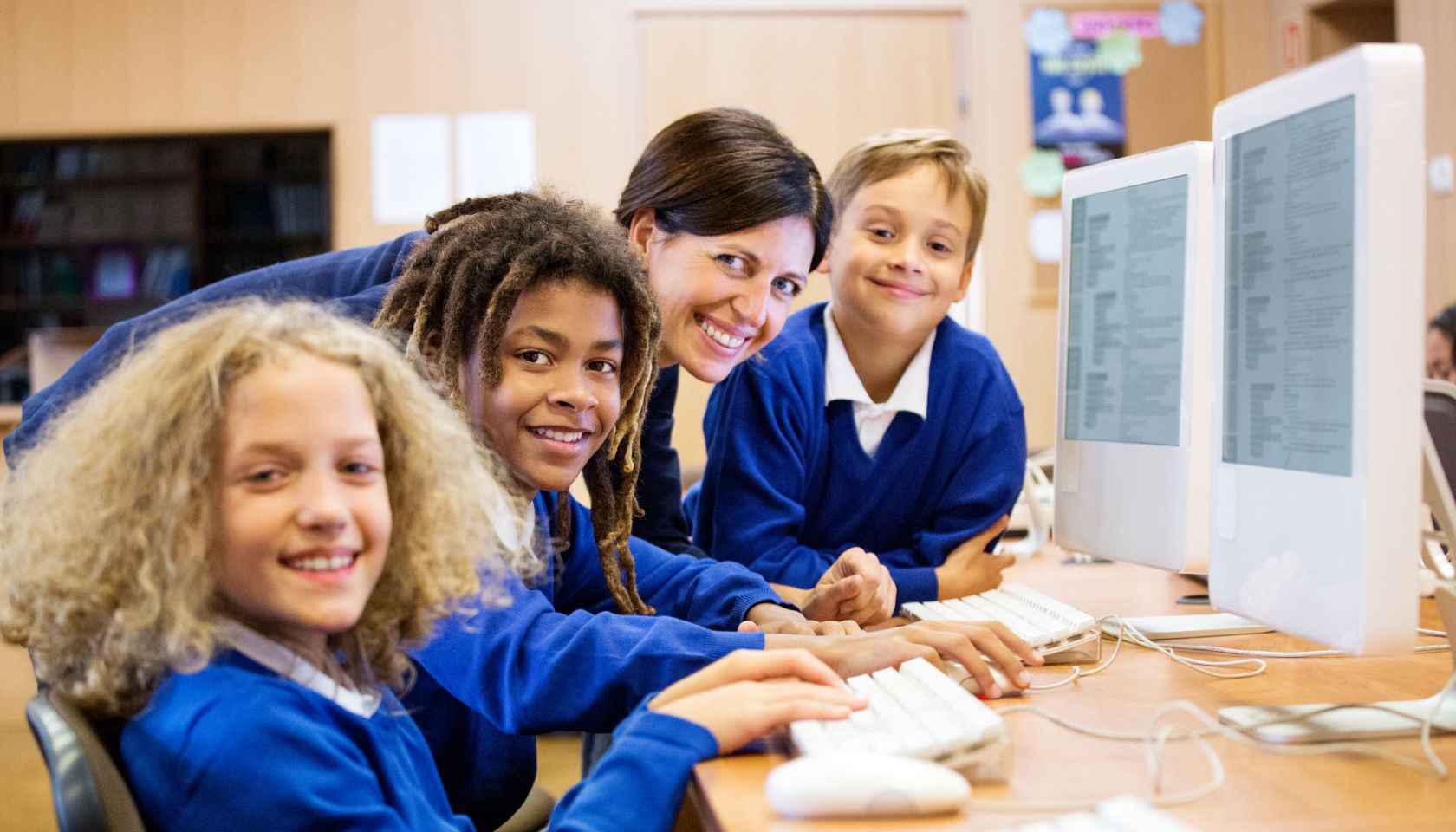 Cute students learning computer programming