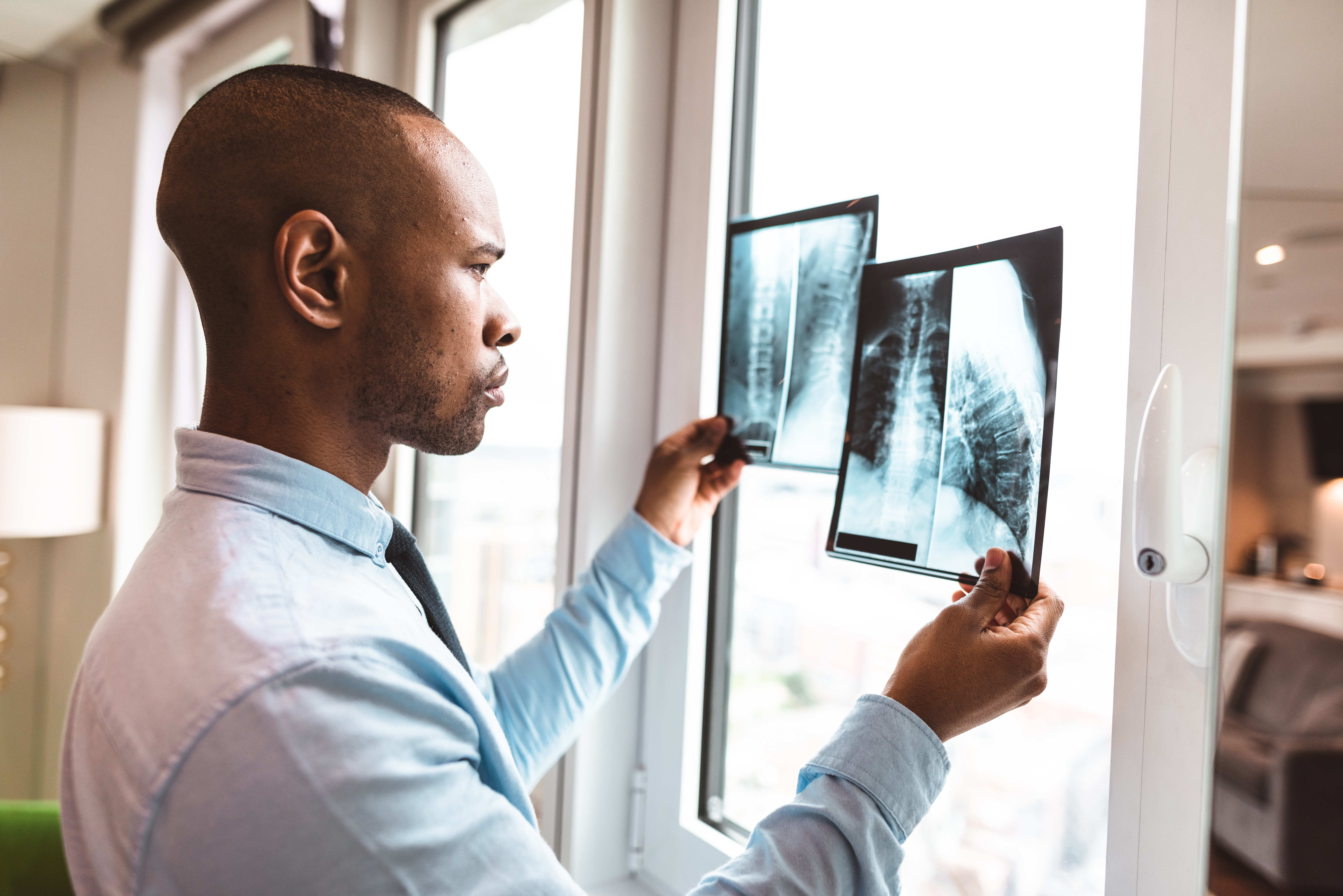 doctor reading the x-ray in the office