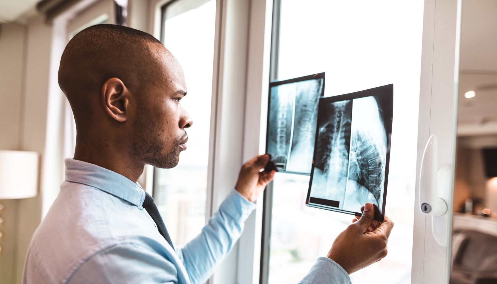 doctor reading the x-ray in the office