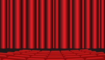 Movie theater with red seats and red curtain