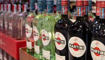 Bottles of Italian vermouth brand Martini displayed for sale...