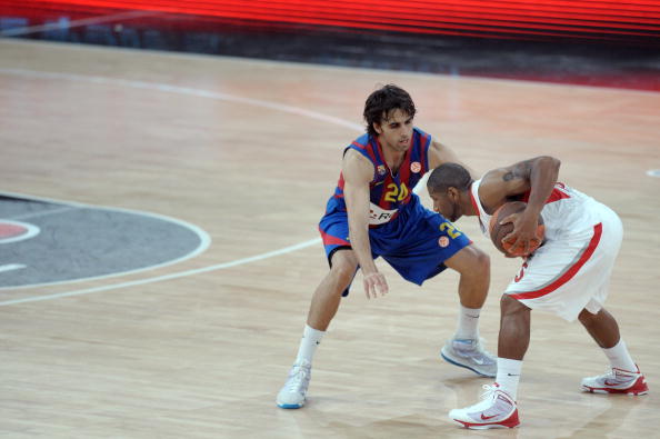 Regal Barcelona's Victor Sada (L) vies w