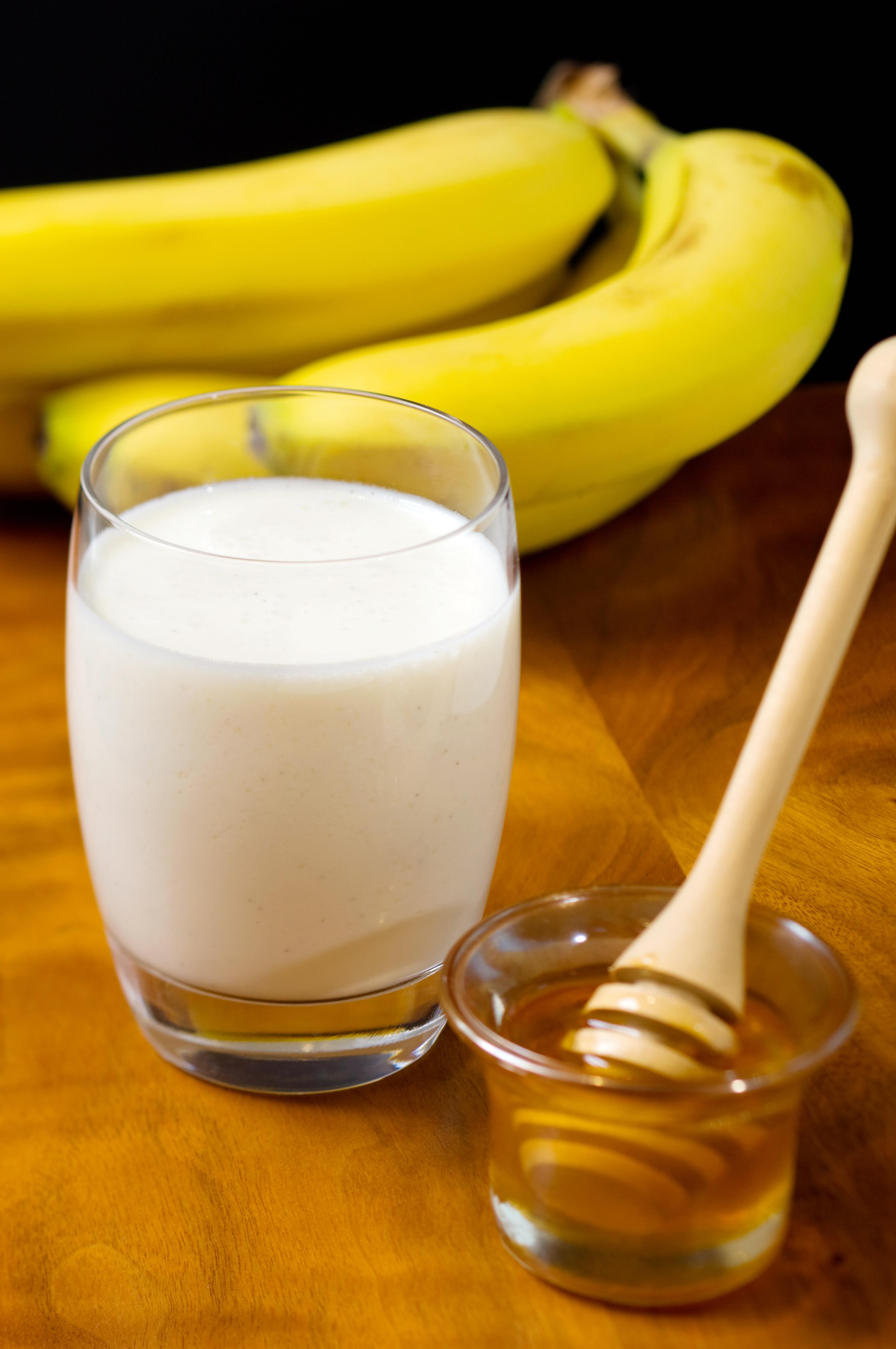 Glass of milk banana and honey