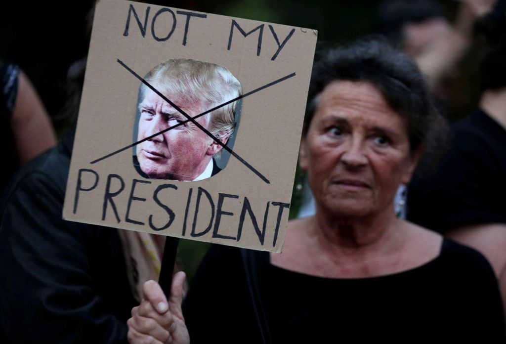 Demonstrators gather in Rome, Italy to protest against the visit of U.S. President Donald Trump