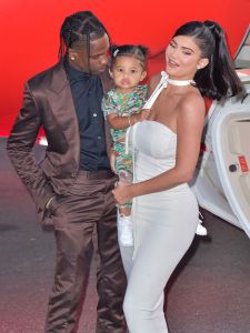 Rapper Travis Scott, Stormi Webster and television personality Kylie Jenner arrive at the Los Angeles Premiere Of Netflix's 'Travis Scott: Look Mom I Can Fly' held at Barker Hangar on August 27, 2019 in Santa Monica, Los Angeles, California, United States