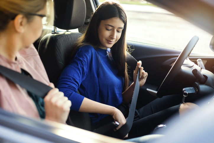 Teenager Having Driving Lesson With Female Instructor