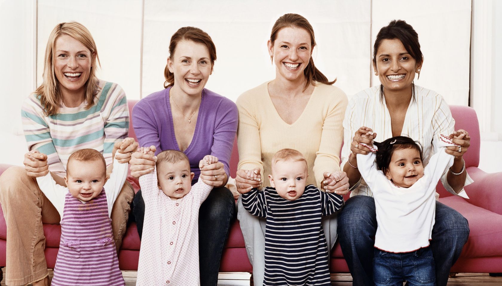 Portrait of Four Young Mothers with Their Babies
