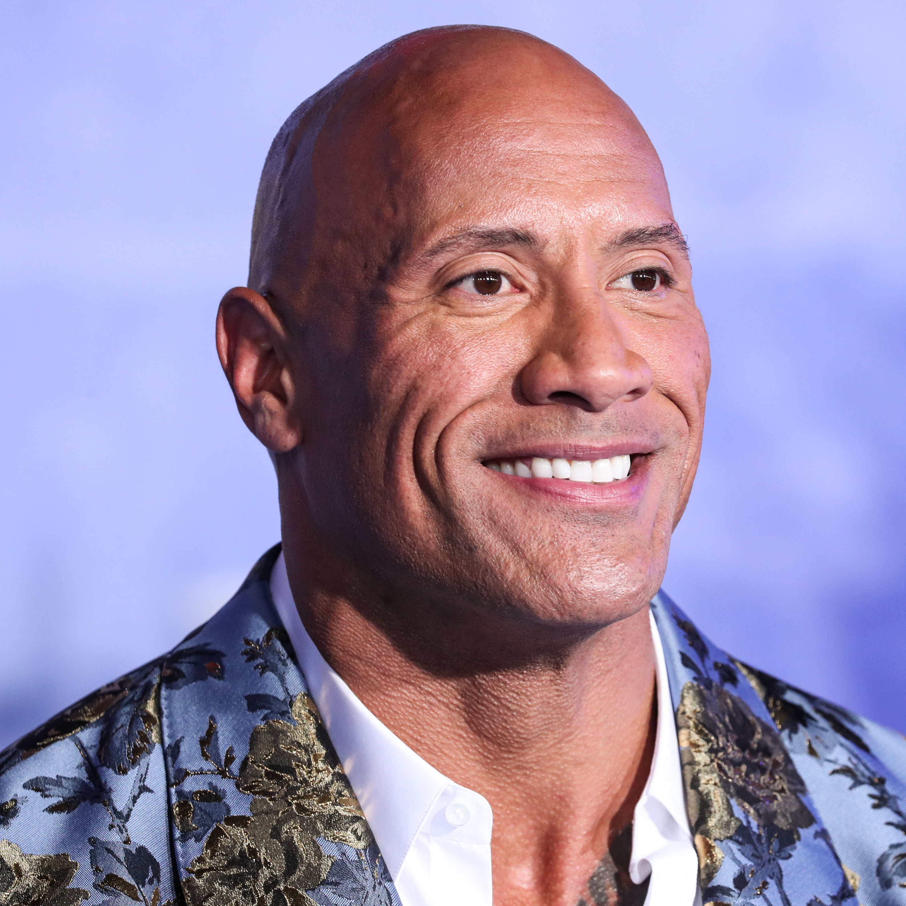 Actor Dwayne Johnson (The Rock) wearing Dolce & Gabbana arrives at the World Premiere Of Columbia Pictures' 'Jumanji: The Next Level' held at the TCL Chinese Theatre IMAX on December 9, 2019 in Hollywood, Los Angeles, California, United States.
