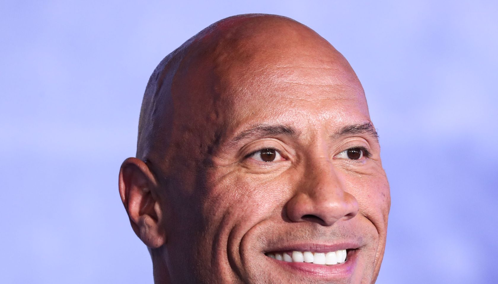 Actor Dwayne Johnson (The Rock) wearing Dolce & Gabbana arrives at the World Premiere Of Columbia Pictures' 'Jumanji: The Next Level' held at the TCL Chinese Theatre IMAX on December 9, 2019 in Hollywood, Los Angeles, California, United States.