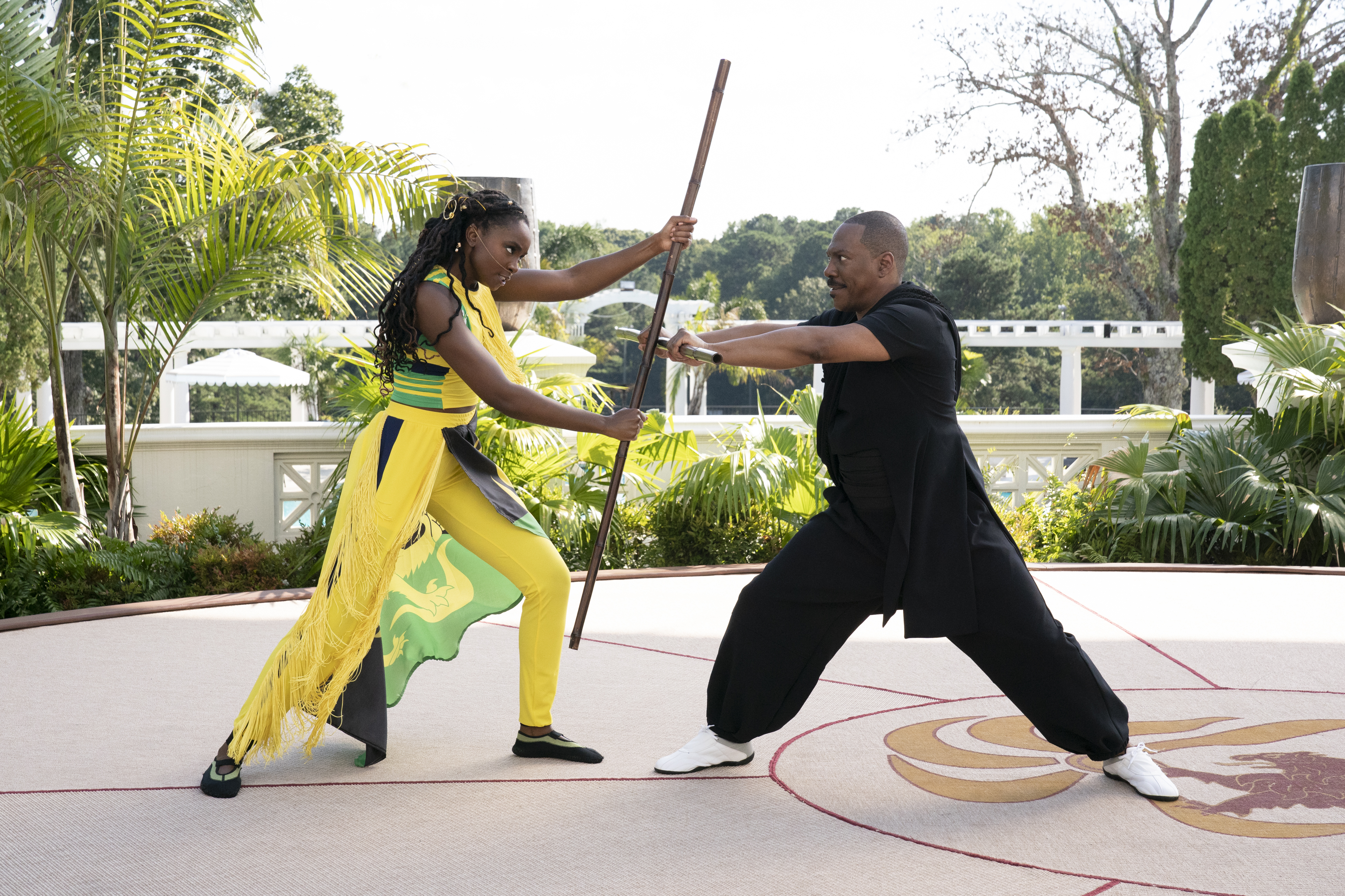 Kiki Layne and Eddie Murphy in Coming 2 America Poster and Production Stills