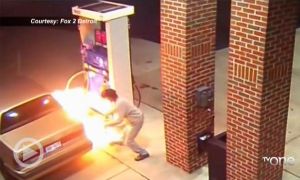 WTH?! Thursday: Man Attempts To Kill A Spider With A Lighter While Pumping Gas At A Gas Station