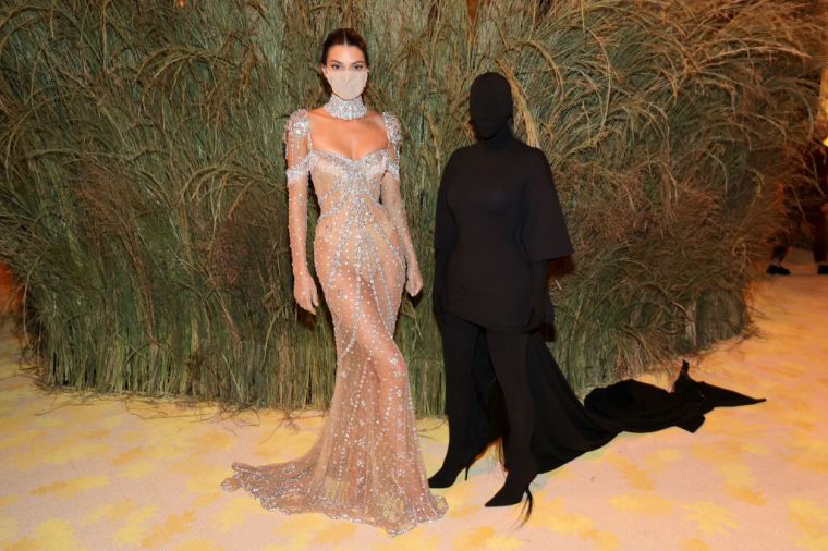 Kendall Jenner wearing Givenchy and Kim Kardashian wearing Balenciaga
