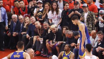 Golden State Warriors Kevin Durant sits on the floor after sustaining an injury to his right leg in the second quarter during game 5 of the NBA Finals between the Golden State Warriors and the Toronto Raptors at Scotiabank Arena on Monday, June 10, 2019