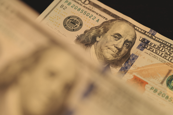 This is a detailed closeup depiction of Benjamin Franklin on the United States Hundred Dollar Bill