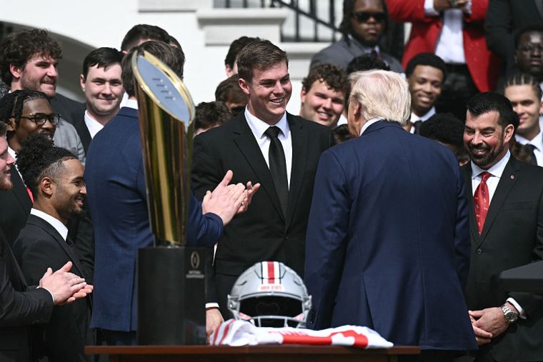 US-POLITICS-TRUMP-COLLEGE-FOOTBALL