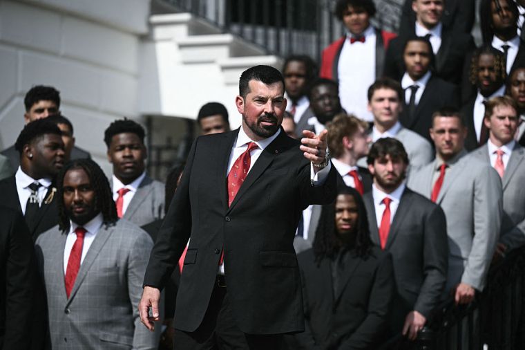 US-POLITICS-TRUMP-COLLEGE-FOOTBALL