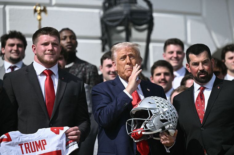 US-POLITICS-TRUMP-COLLEGE-FOOTBALL