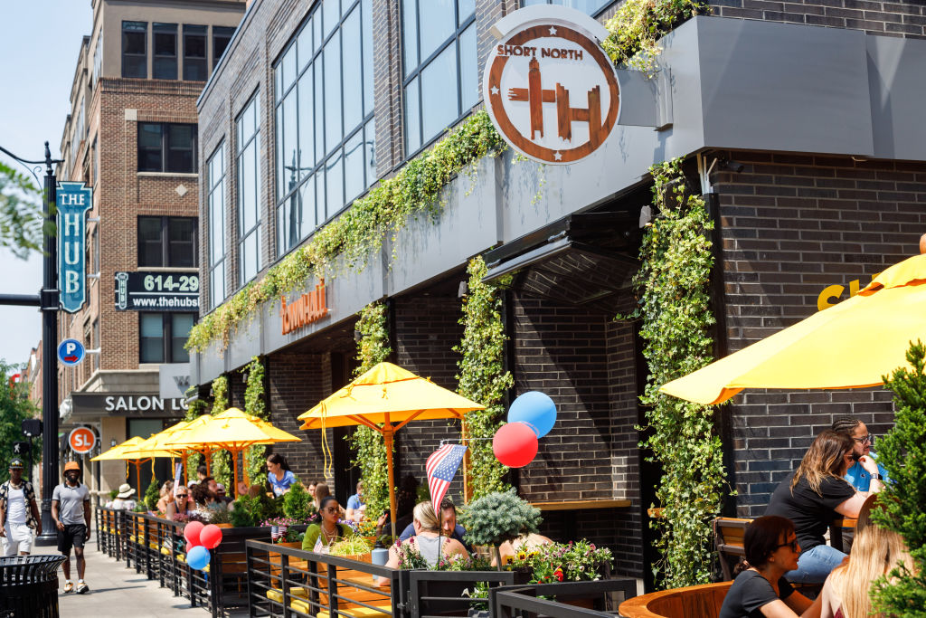 Patrons sit in the Short North's Town Hall for lunch after...