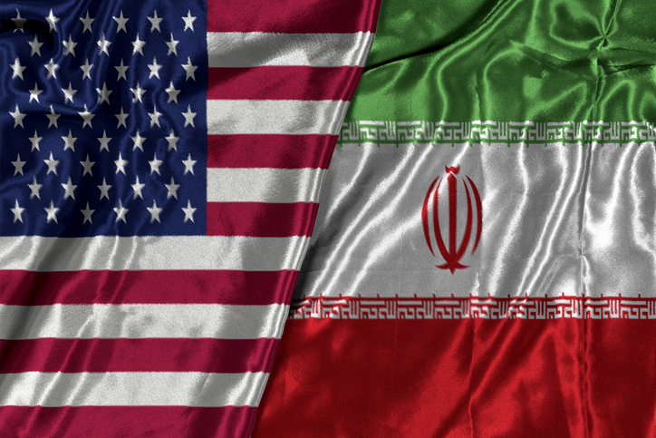 United States And Iran Flags Draped Together Representing Diplomacy, Tension, And International Relations
